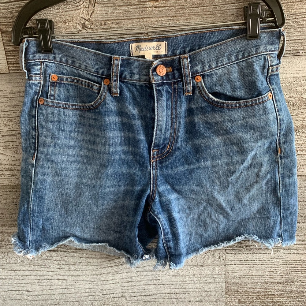 Madewell denim shorts with frayed accents. size 26
